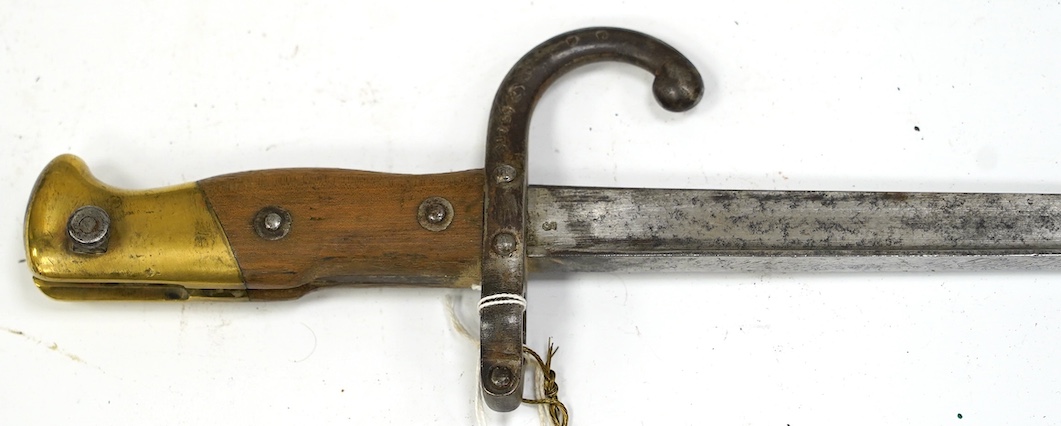 A French T-section bayonet for a Gras rifle, dated 1879. Condition - fair, pitted and worn